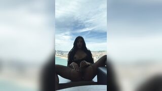 TSJoaFitness Masturbates With Buttplug On The Balcony